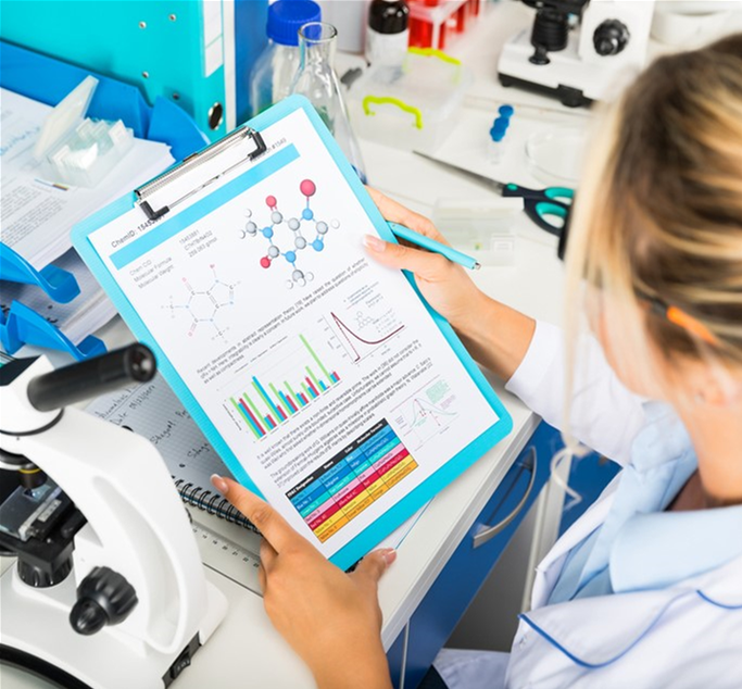 Woman reviewing data from a research project